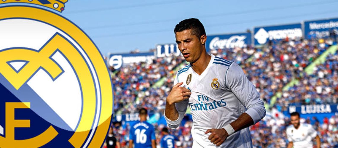 Real Madrid's Portuguese forward Cristiano Ronaldo crosses himself to celebrate his team's second goal during the Spanish league football match Getafe CF vs Real Madrid CF at the Col. Alfonso Perez stadium in Getafe on October 14, 2017. / AFP PHOTO / OSCAR DEL POZO        (Photo credit should read OSCAR DEL POZO/AFP/Getty Images)