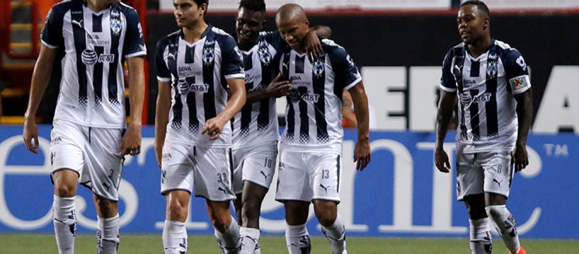Monterrey players celebrate after their third goal against Tijuana during a Torneo Apertura 2017 Liga MX match at Caliente Stadium in Tijuana, Mexico on August 4, 2017.  / AFP PHOTO / Guillermo Arias        (Photo credit should read GUILLERMO ARIAS/AFP/Getty Images)