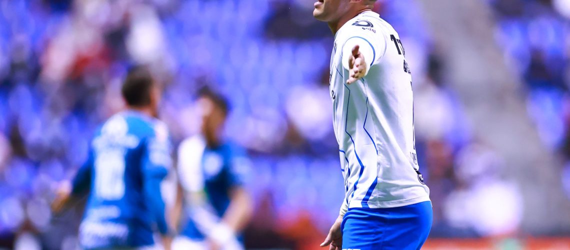 PUEBLA, MEXICO - FEBRUARY 18: Rogelio Funes Mori #7 of Monterrey reacts  during the 6th round match between Puebla and Monterrey as part of the Torneo Grita Mexico C22 Liga MX at Cuauhtemoc Stadium on February 18, 2022 in Puebla, Mexico. (Photo by Hector Vivas/Getty Images)